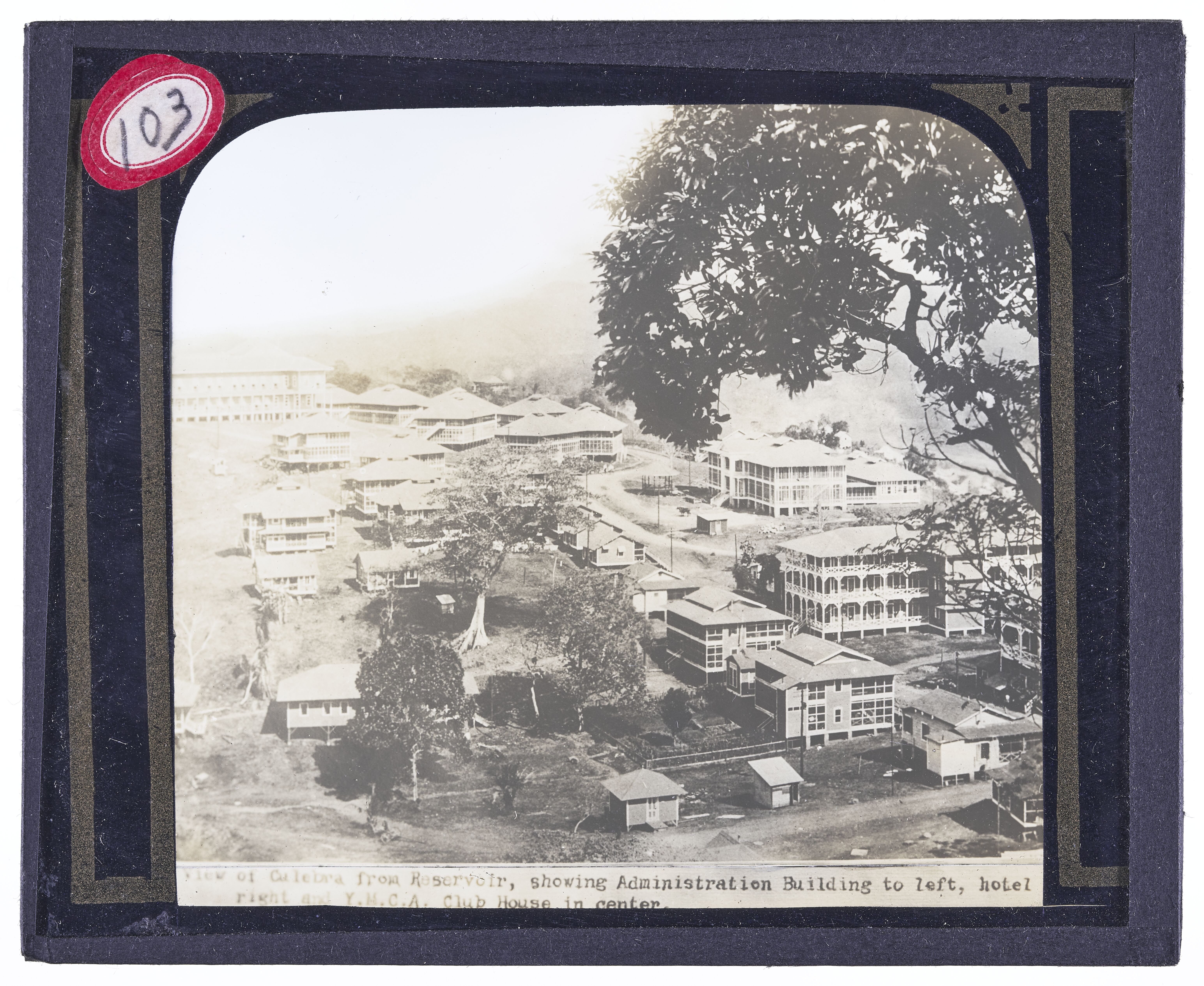 View of Culebra from Reservoir, showing Administration Building to left, hotel to the right and Y. M