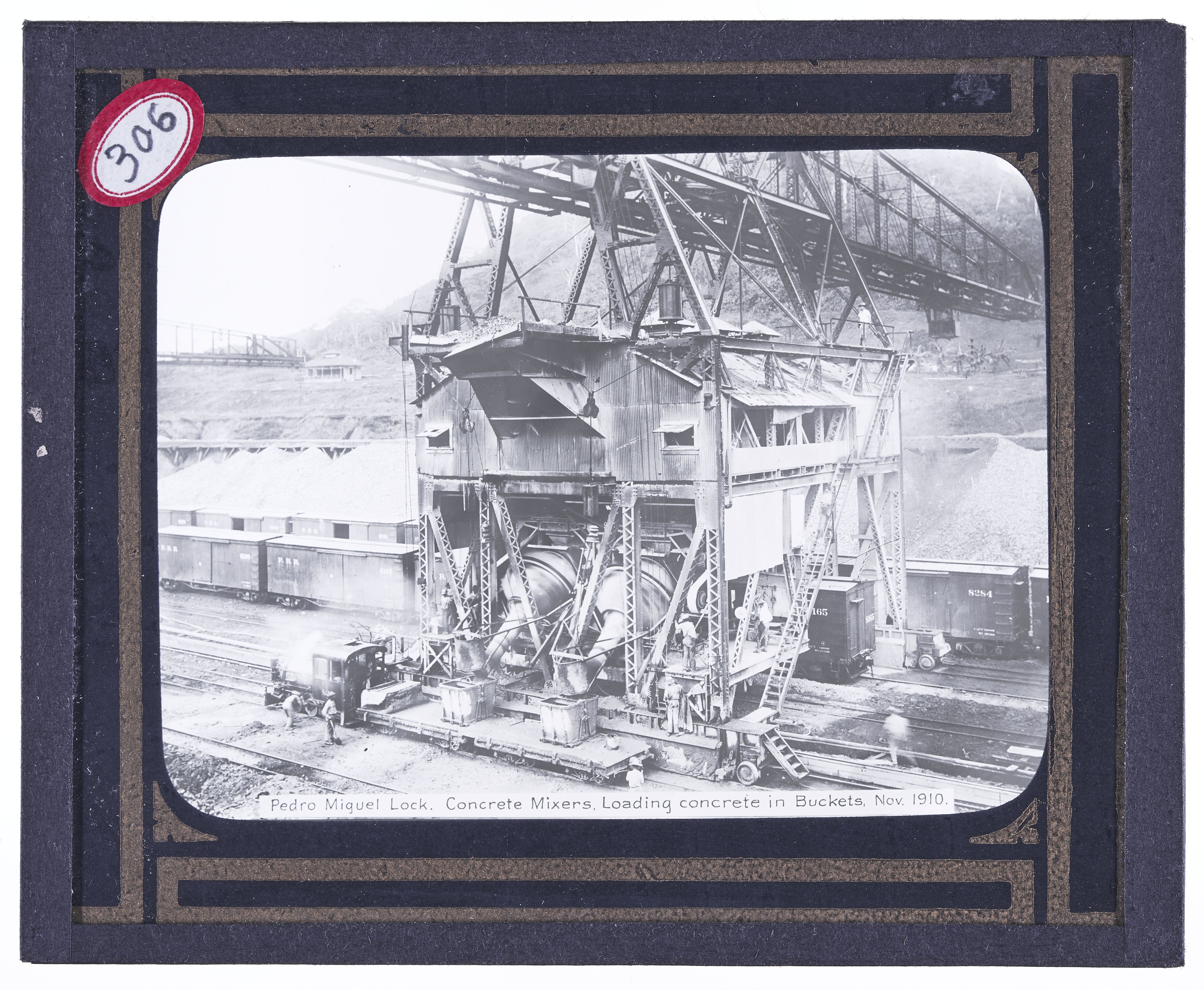 Pedro Miguel Lock. Concrete Mixers, Loading Concrete in Buckets. November, 1910